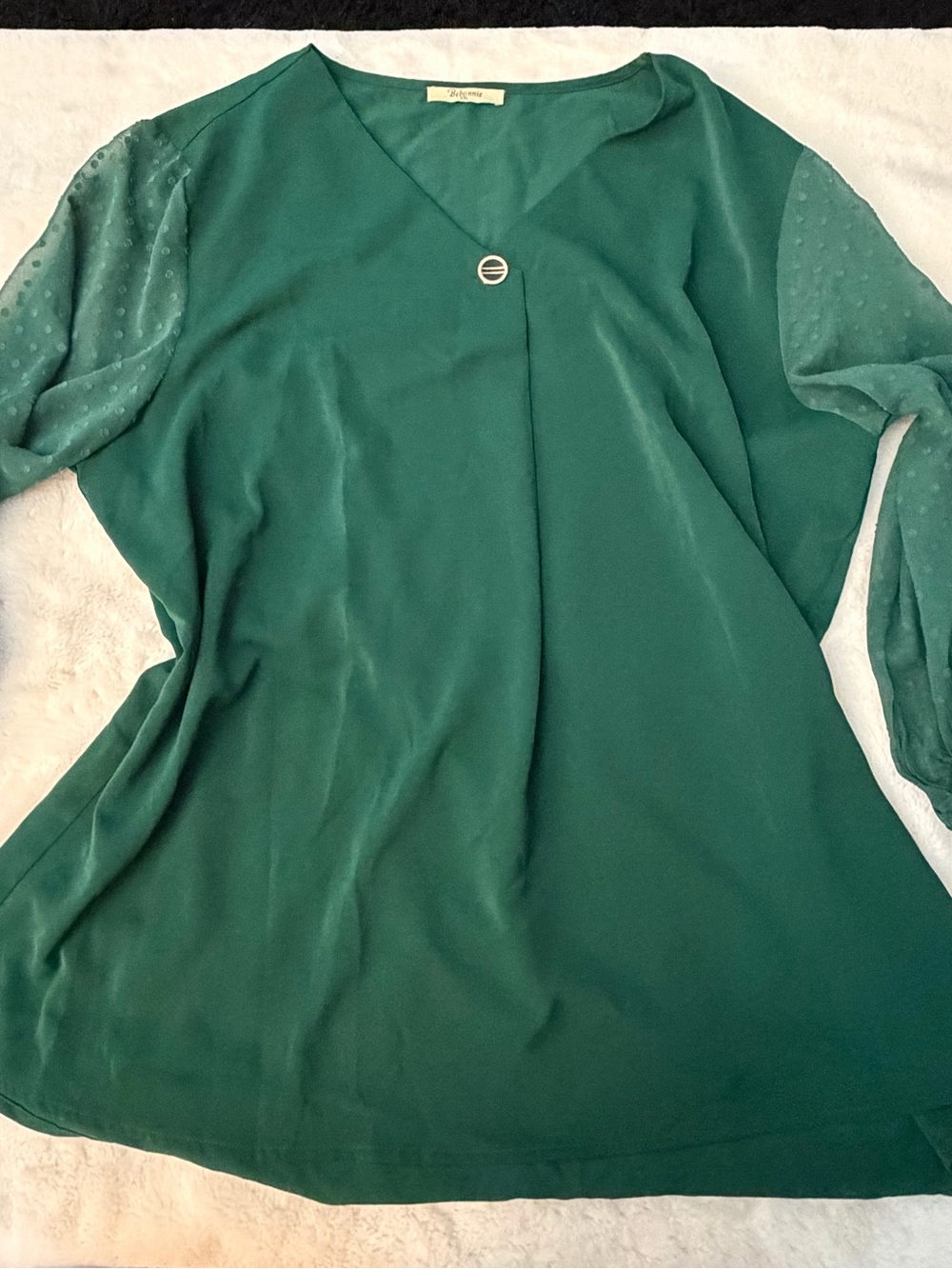 Elegant Green V-Neck Blouse with Sheer Dot Sleeves